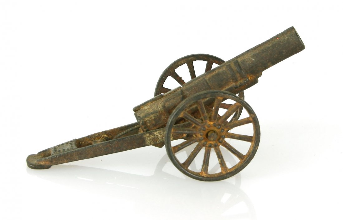 Vintage Cast Iron Artillery Piece: Early piece model of a late 1800's model cannon. Spring-fired with original spring intact. From the Nick Hadden Vintage Toy Collection.