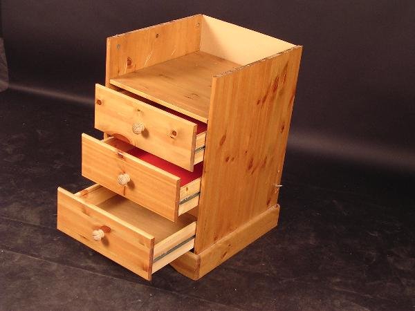 691: A MODIFIED PINE BEDSIDE CHEST OF DRAWERS