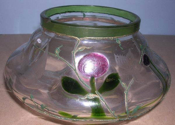 ATTRIBUTED TO THOMAS WEBB, A BOWL: Attributed to Messrs Thomas Webb, an early 20th century bowl, the compressed bun shape with floral inclusions of red, purple and green amongst trailed vines with traces of original gilding and an engr