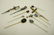 205: TEN VARIOUS STICK PINS