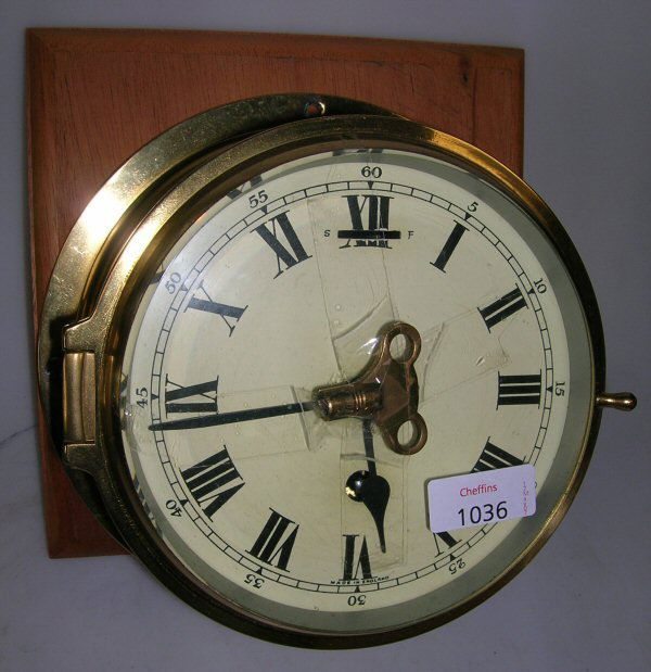 Colonial Metal Cased Mantel Clock. Brass Price Guide