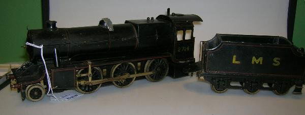 AN 0 GAUGE LIVE STEAM 2-6-0 LOCOMOTIVE LMS NO.271: An 0 gauge Live Steam 2-6-0 locomotive LMS No.2714 and six wheel tender, with lever through cab roof, burner, some repainting and repair to tender, play wear to loco, possibly some retouching, some sc
