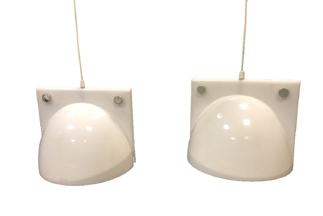 Harvey Guzzini, a pair of white acrylic 'Orione': Harvey Guzzini, a pair of white acrylic 'Orione' pendant lights, circa 1970 30 x 30cm (12 x 12in)