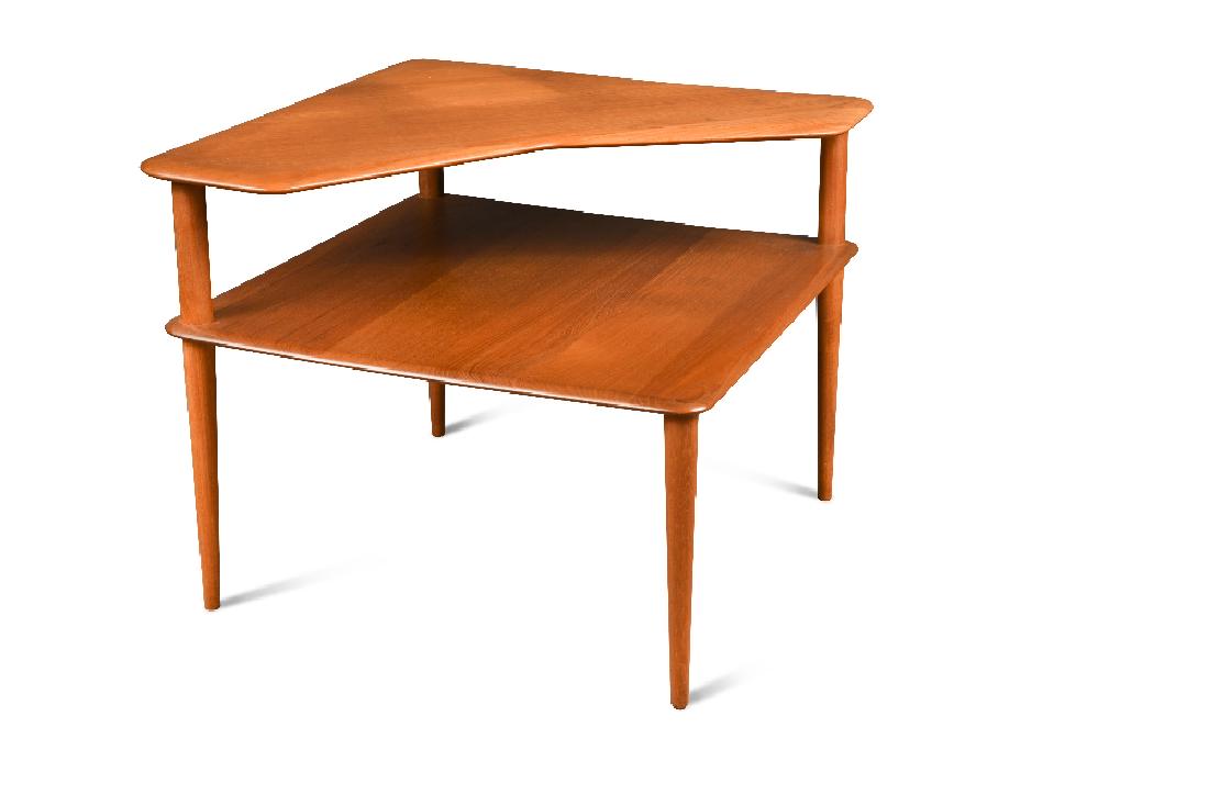Peter Hvidt & Orla Mølgaard-Nielsen for France &: Peter Hvidt & Orla Mølgaard-Nielsen for France & Son, a teak corner table, with cut-away upper tier raised on tapering supports, label to underside 64 x 78 x 78cm (25 x 30 x 30in)