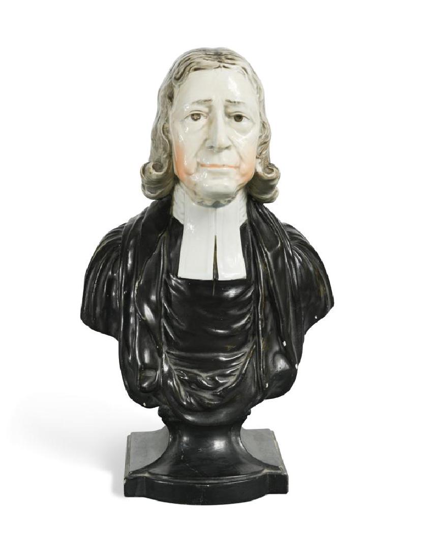 A Staffordshire pottery bust of John Wesley, by Enoch: A Staffordshire pottery bust of John Wesley, by Enoch Wood of Burslem, circa 1800 the reverse impressed with a dedication plaque, raised on a socle base, 30cm (12in) high
