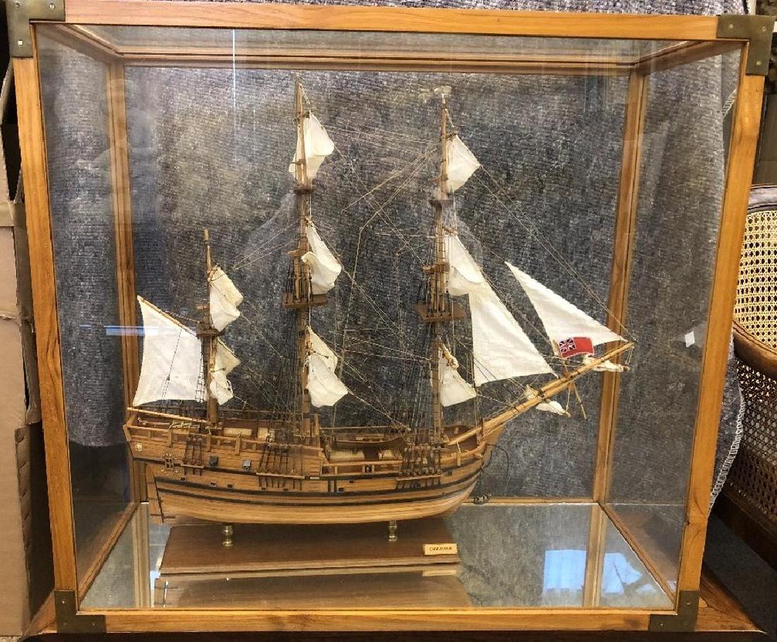 Endeavour' a wooden model ship,: Endeavour' a wooden model ship, within a bespoke glazed display case with brass corners 79 x 86 x 35cm (31 x 34 x 14in)
