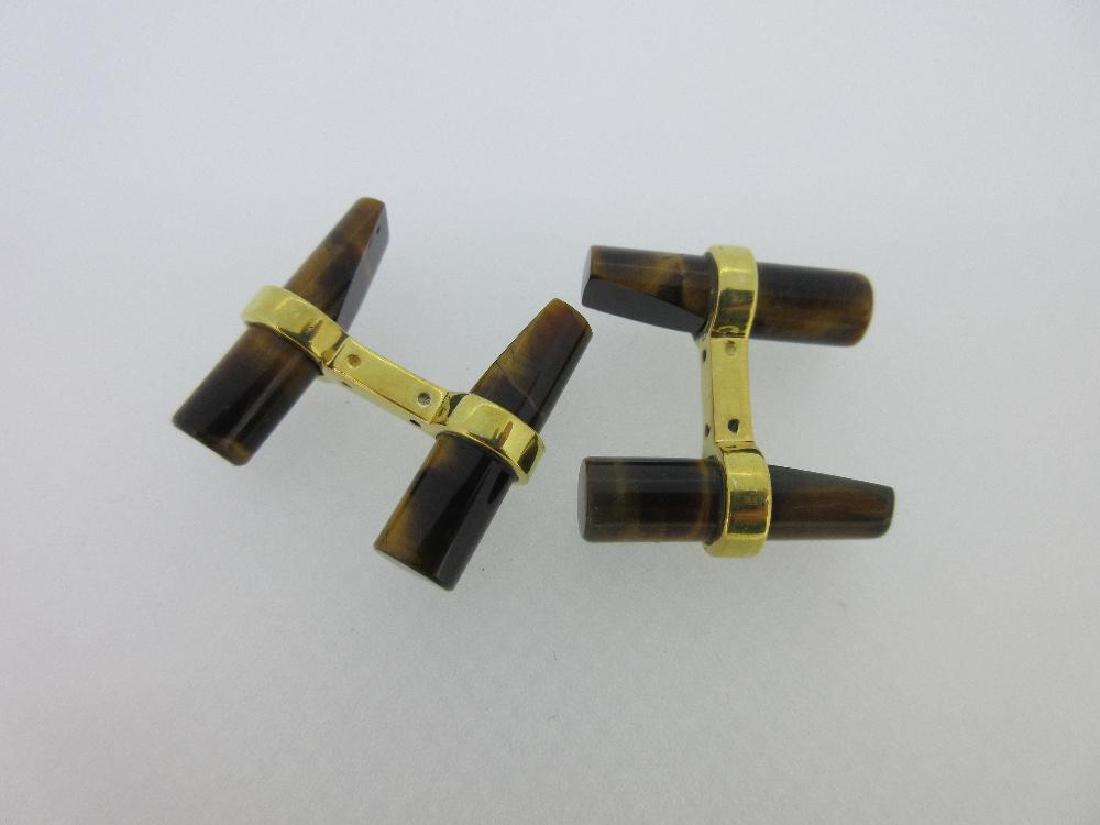 A pair of tiger's eye baton double-ended cufflinks, (1 of 3)
