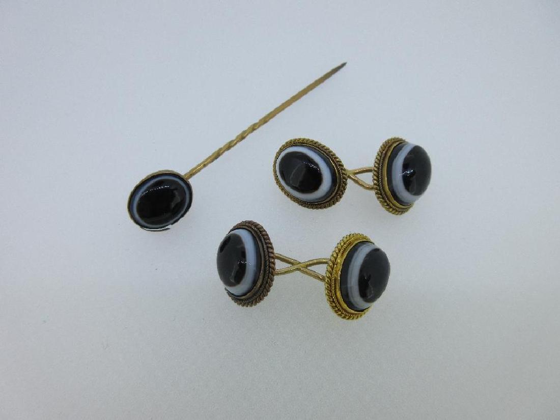 A pair of antique banded onyx double ended cufflinks (1 of 2)