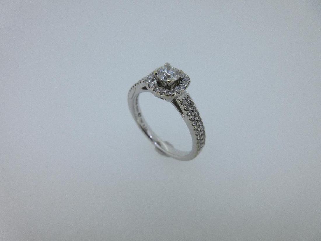 A modern diamond cluster ring set in 18ct white gold, (1 of 6)