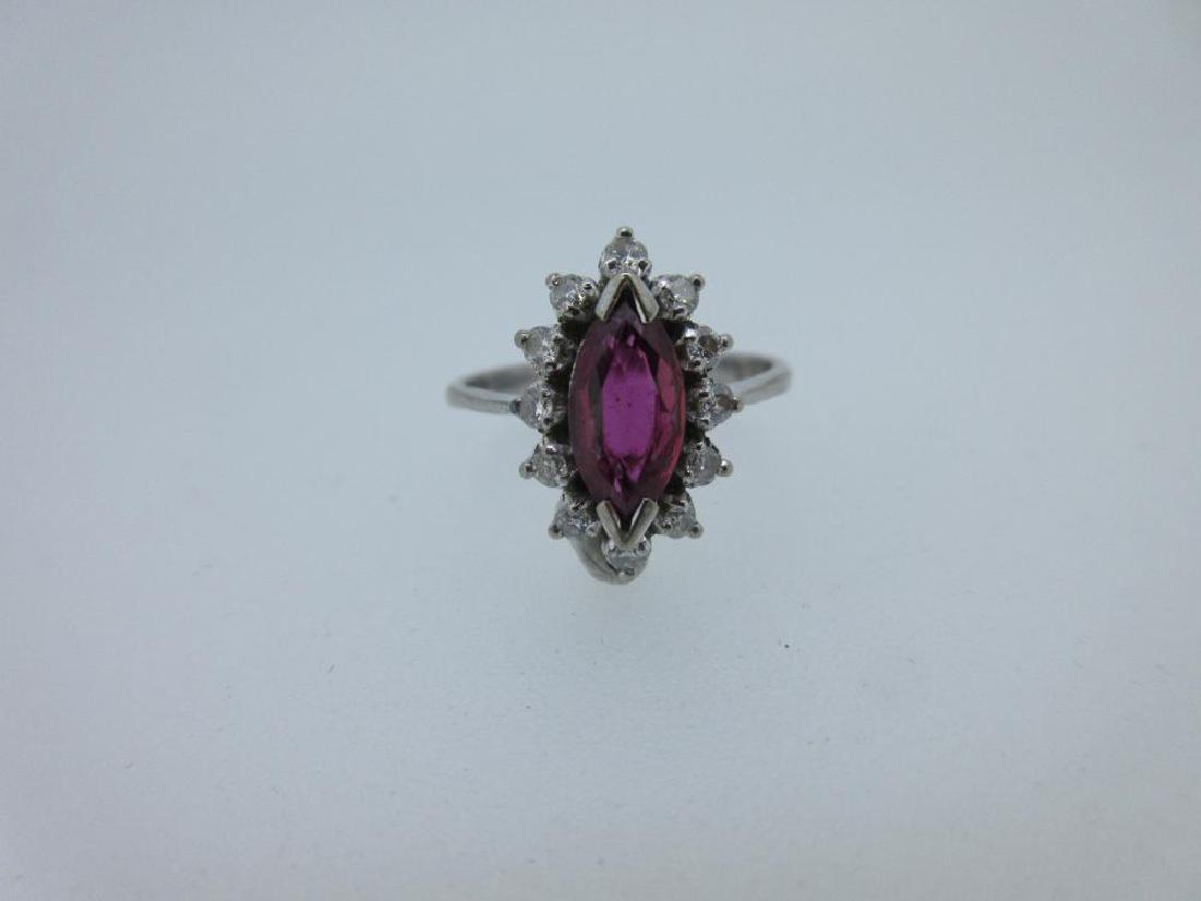 A marquise ruby and diamond cluster ring, (1 of 6)