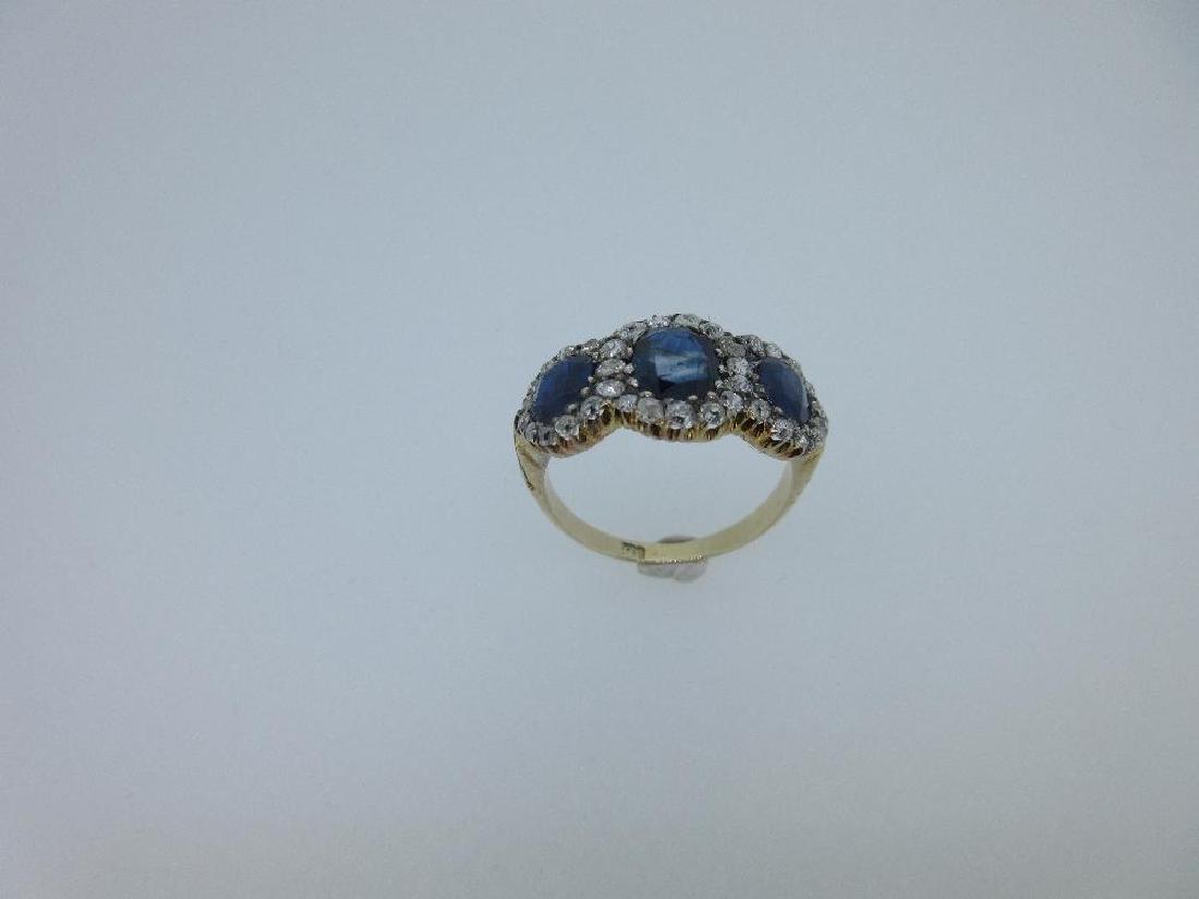 An Edwardian sapphire and diamond triple cluster ring, (1 of 7)