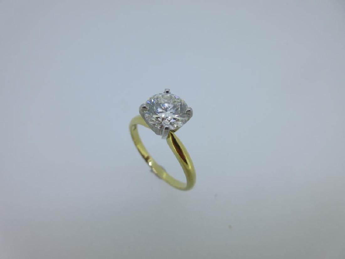 A 1.60ct diamond single stone ring, (1 of 6)