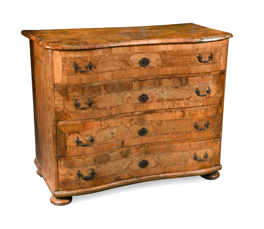 An 18th century olive wood Maltese commode,: An 18th century olive wood Maltese commode, of en arbalete outline, on four squat bun feet 101 x 122 x 59cm (39 x 48 x 23in)