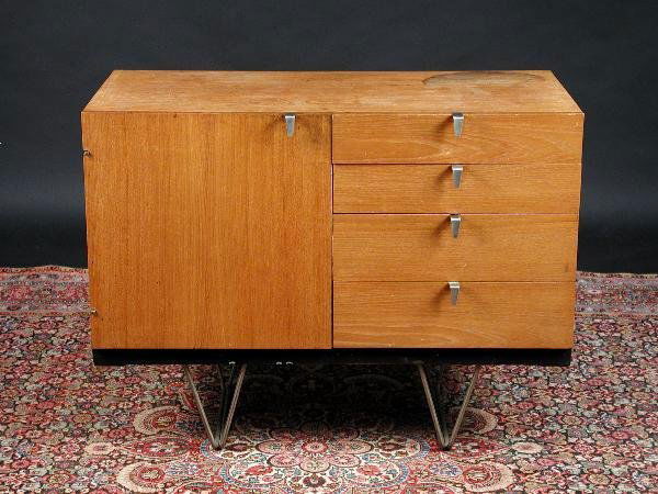 A STAG SIDEBOARD BY JOHN & SYLVIA REID, 1959: John & Sylvia Reid for Stag furniture, A sideboard, circa 1959, with cupboard door to left and four short drawers to the right, 70cm high x 91cm wide