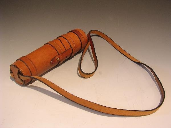 A GOOD LEATHER TELESCOPE CASE, WITH SHOULDER STRA