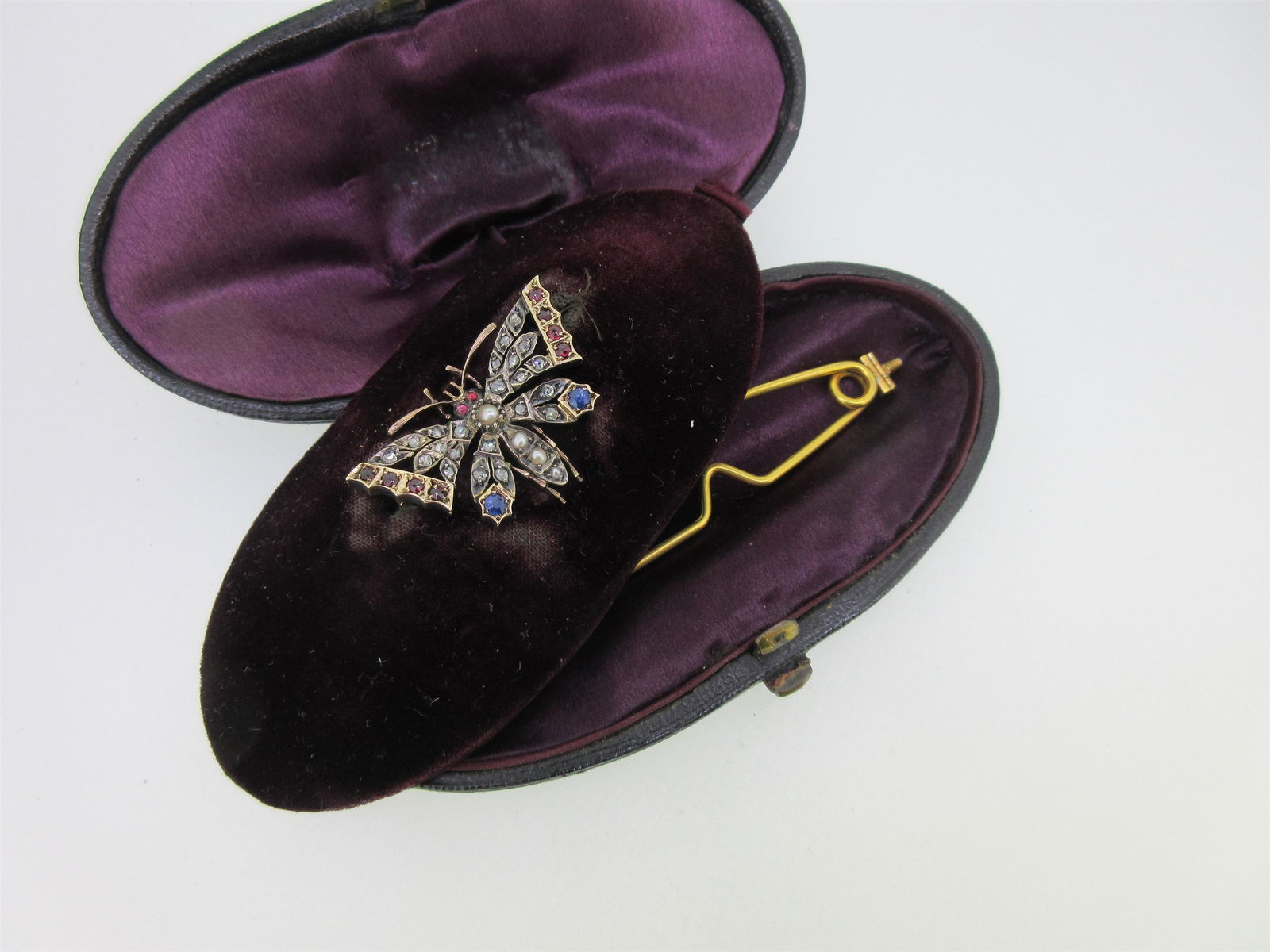 A Victorian diamond, sapphire and ruby butterfly brooch (1 of 9)