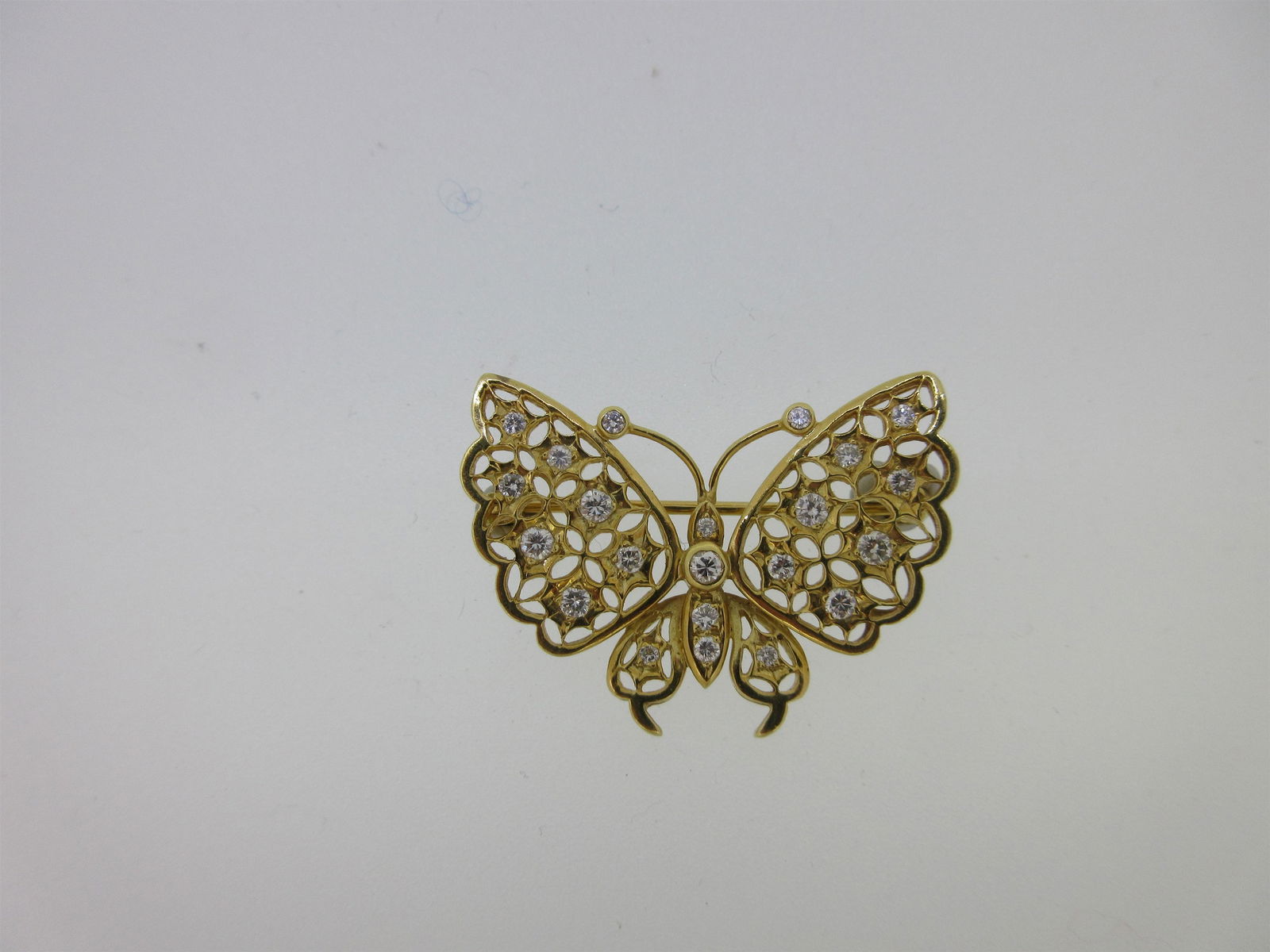 A diamond butterfly brooch, (1 of 4)