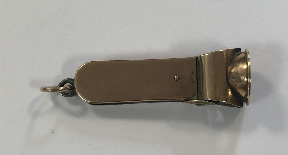 An Edward VII 9ct gold mounted cigar cutter, (1 of 4)