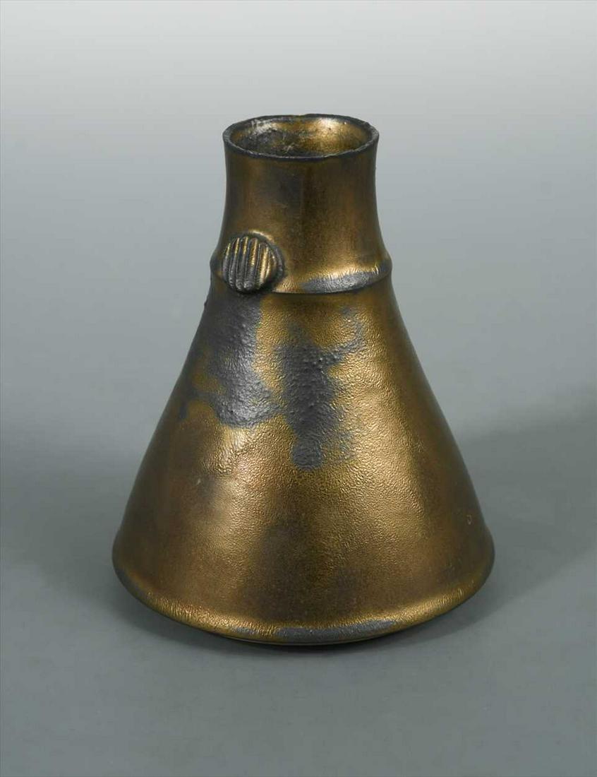 Peter Beard (British, born 1951), a bronze glazed vase,: of inverted funnel form with applied textured roundels, impressed marks (Dimensions: 14cm high)(14cm high)