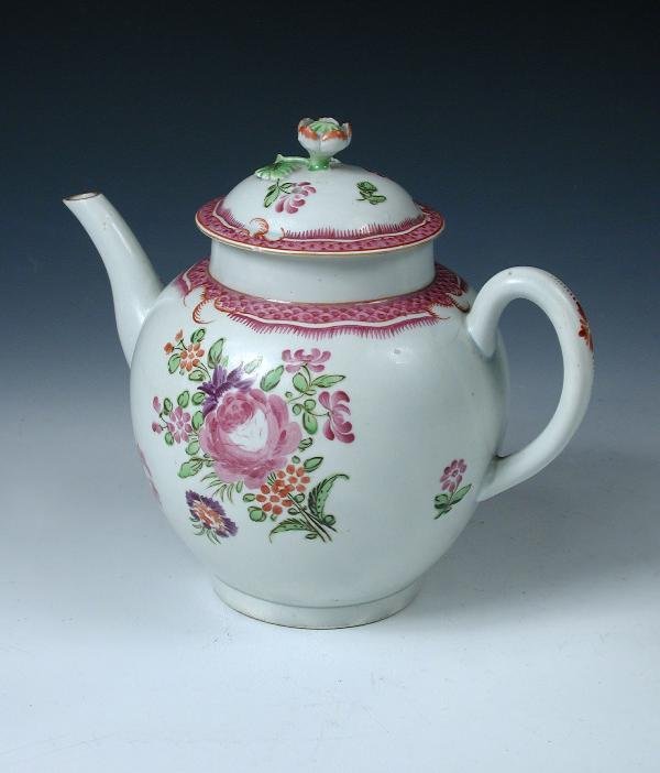 A TEA POT AND COVER