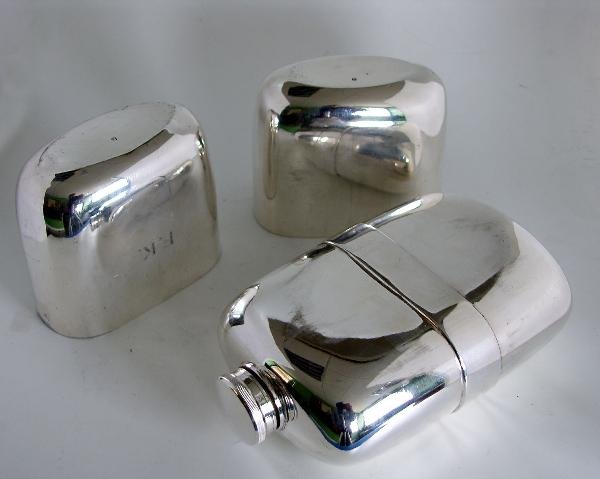 AN OUTSIZED ELECTROPLATE SPIRIT FLASK
