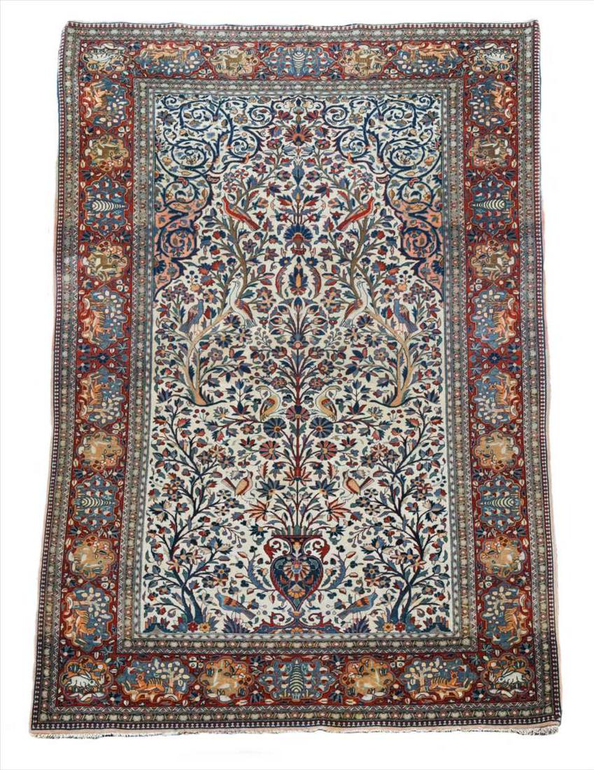 A finely-woven Kashan rug,: the Tree of Life design within a cream field and madder border, 206 x 126 cm Provenance: Purchased from Brian MacDonald in 2001