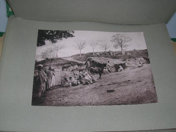 PHOTOGRAPHS. FOLDER OF APPROXIMATELY 85 MOUNTED PH - 3