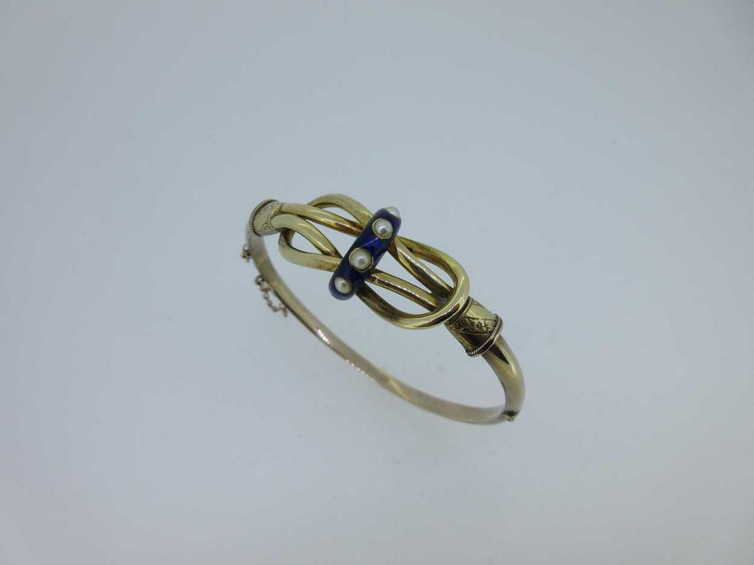 A Victorian hinged bangle with enamel and seed pearl (1 of 6)