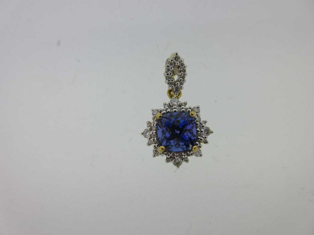 A tanzanite and diamond cluster pendant set in 18ct (1 of 5)