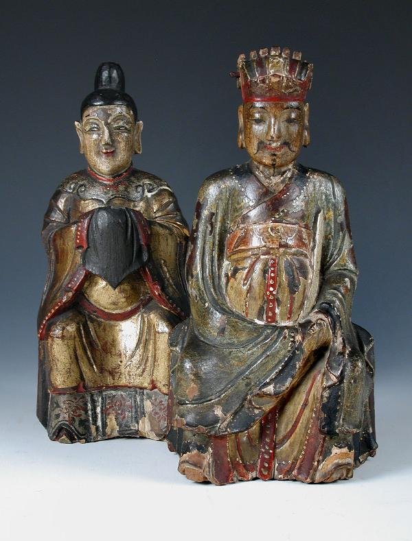 A PAIR OF CHINESE LACQUERED WOOD FIGURES