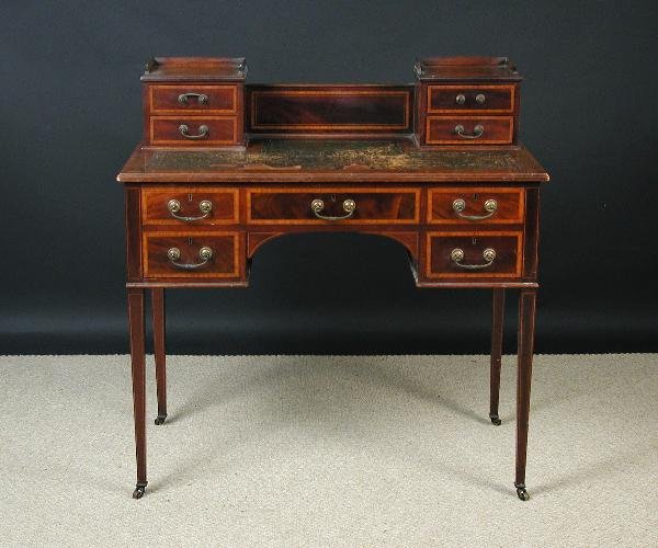 AN EDWARDIAN MAHOGANY BONHEUR DU JOUR C.1910