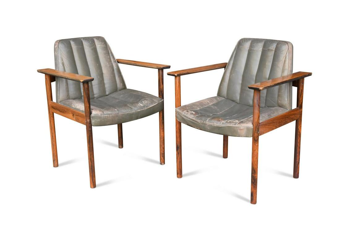 Sven Ivar Dysthe (Norwegian, born 1931) for Dokka Mobler, a pair of elbow chairs, 1960s,: the rosewood frames with grey leather upholstery 82 x 64 x 55cm