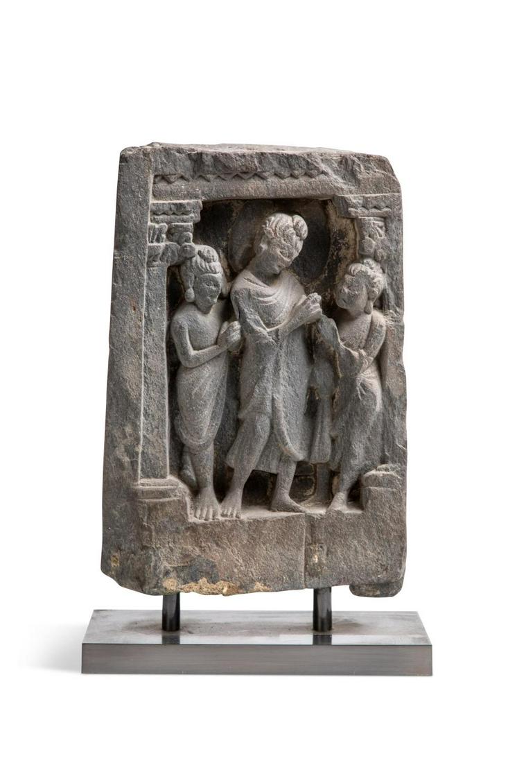 A Gandharan grey schist Buddha and two disciples temple panel, 2nd/3rd century, (1 of 5)