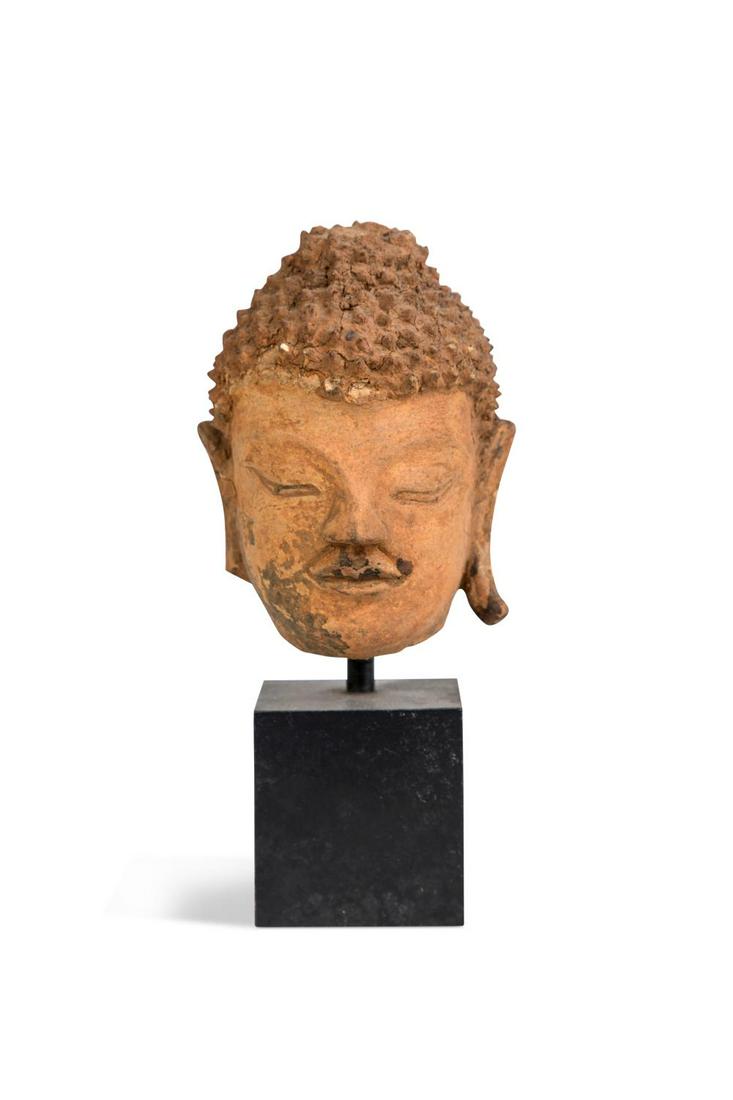 A Thai small stucco head of Buddha, perhaps Sukothai, 13th century, (1 of 7)