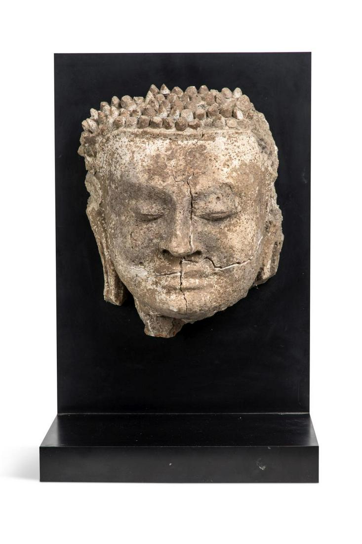 A Thai stucco head of Buddha, Haripunjaya School, probably 13th century, (1 of 9)