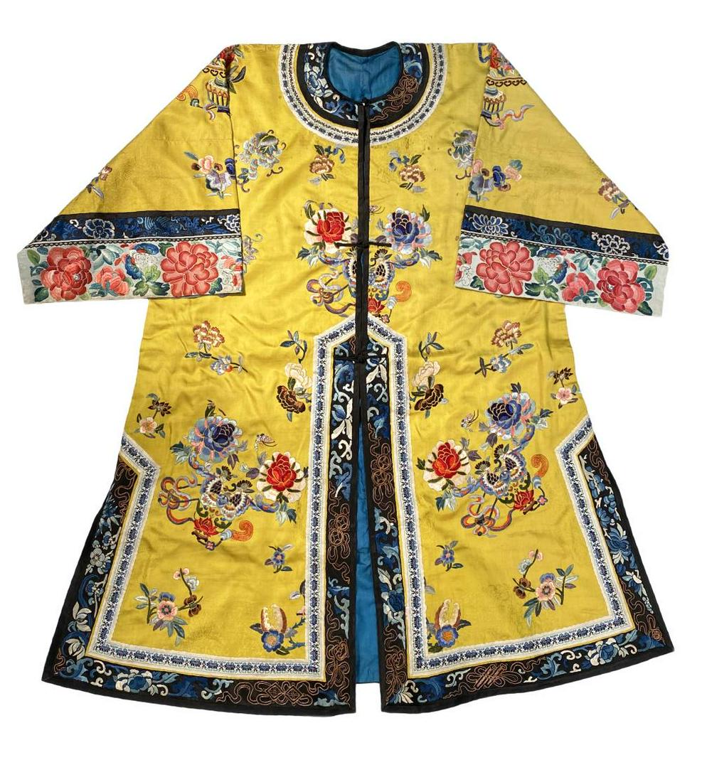 A Chinese yellow satin silk woman's jacket, Qing Dynasty, late 19th/early 20th century, (1 of 6)