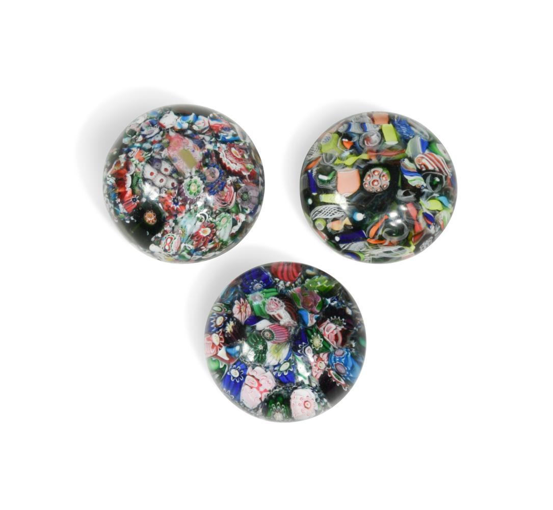 A group of three scrambled millefiori glass paperweights, (1 of 10)