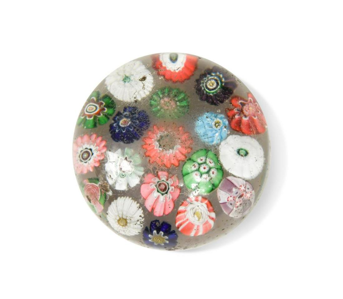 A Clichy spaced millefiori glass paperweight, (1 of 4)