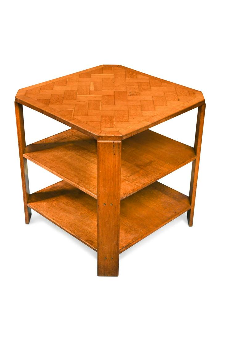 An Art Deco pale oak book table in the manner of Heal's, circa 1930, (1 of 2)