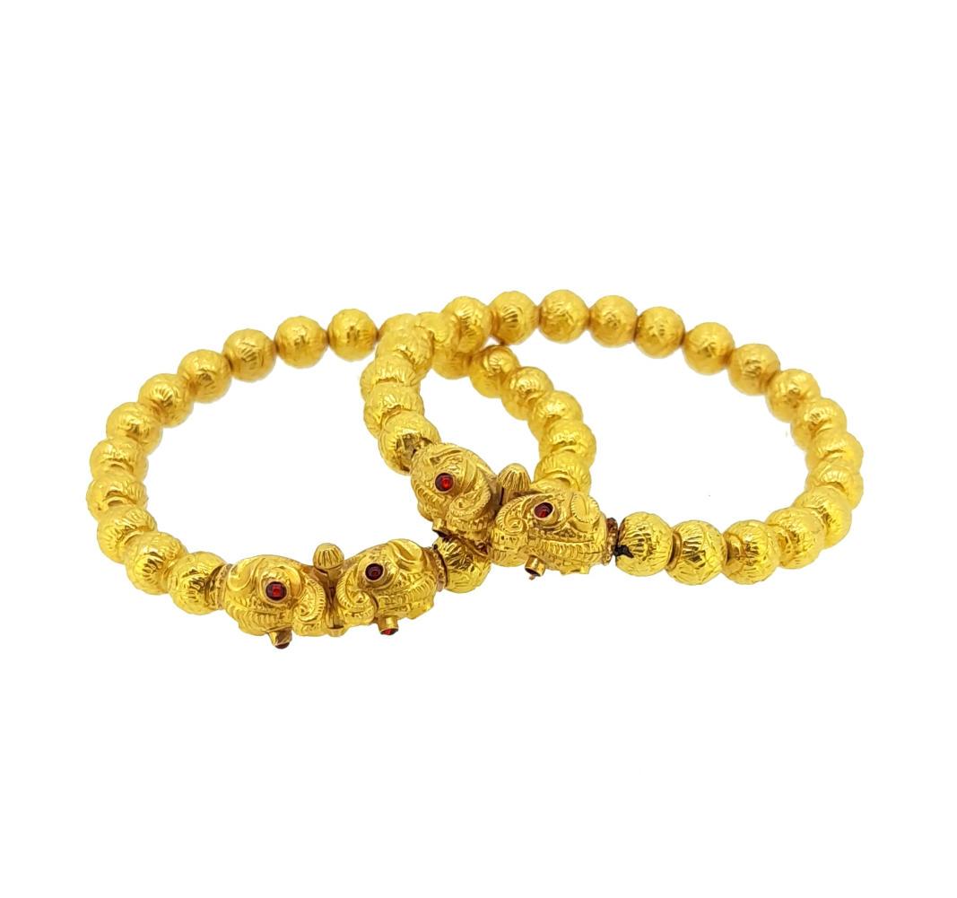 Two Asian bangles, (1 of 4)