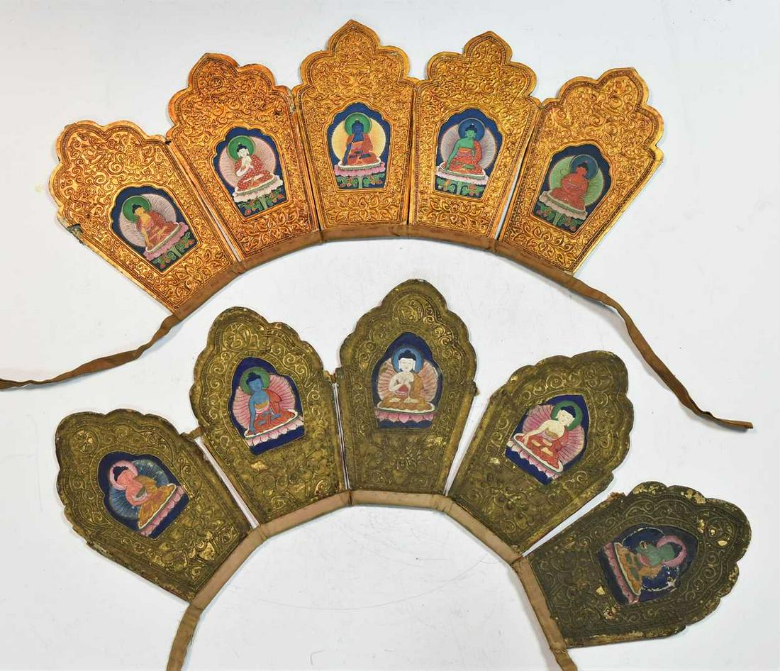 A Tibetan five-panel llama crown, 19th century, each lacquered and gilded section hand painted with: A Tibetan five-panel llama crown, 19th century, each lacquered and gilded section hand painted with a Buddha, 17cm high maximum width 53cm; together with a similar later example First described - poor