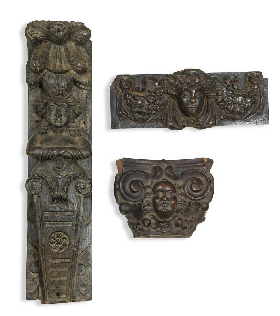 A carved walnut column capital, probably 17/18th century,: A carved walnut column capital, probably 17/18th century, with scroll and mask detail 13 x 16.5cm; together with a Continental small carved walnut female mask panel, 18th century, the face supporting 