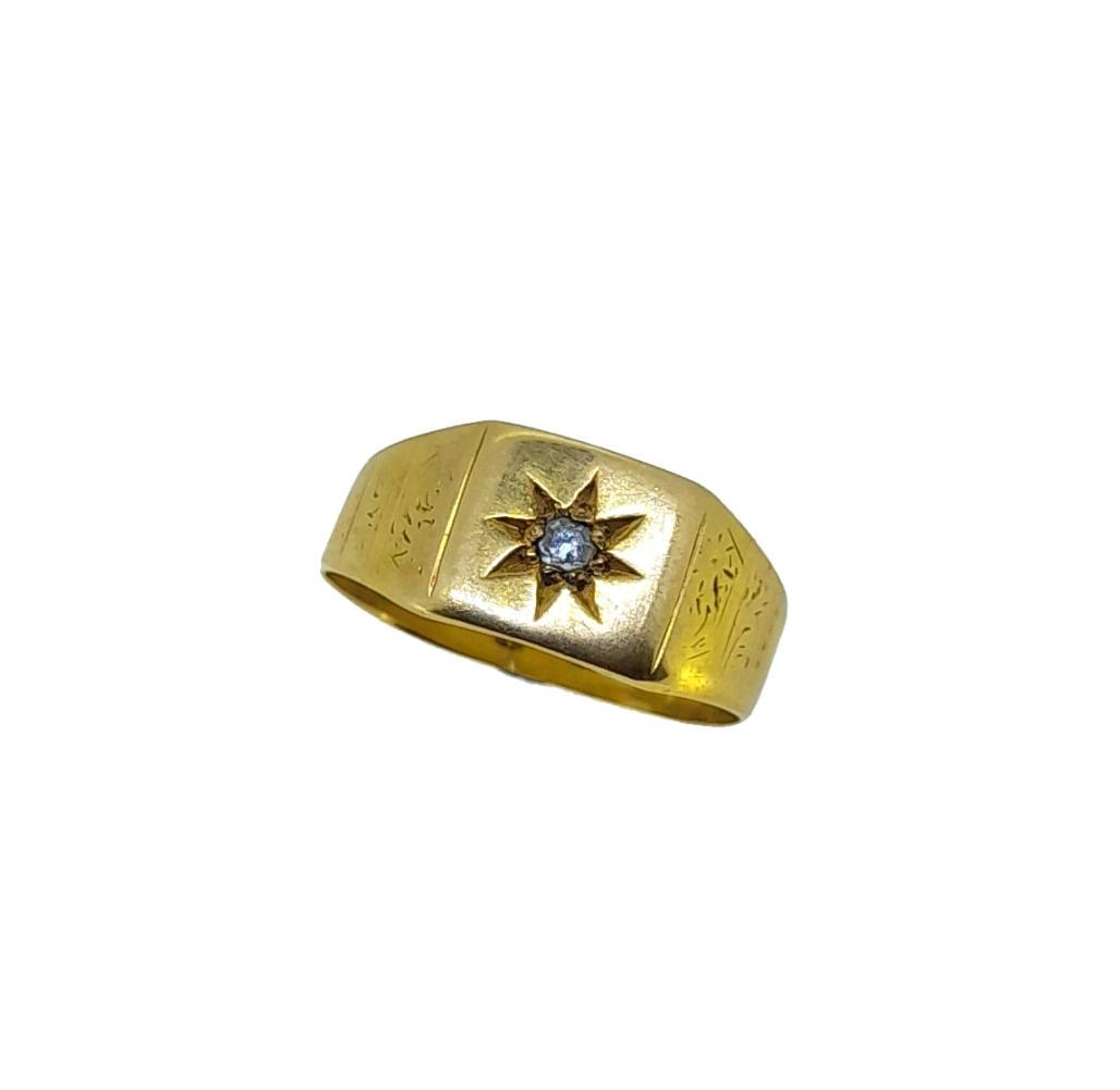 An early 20th century 18ct gold diamond set signet ring, rectangular head with a star set old cut (1 of 3)