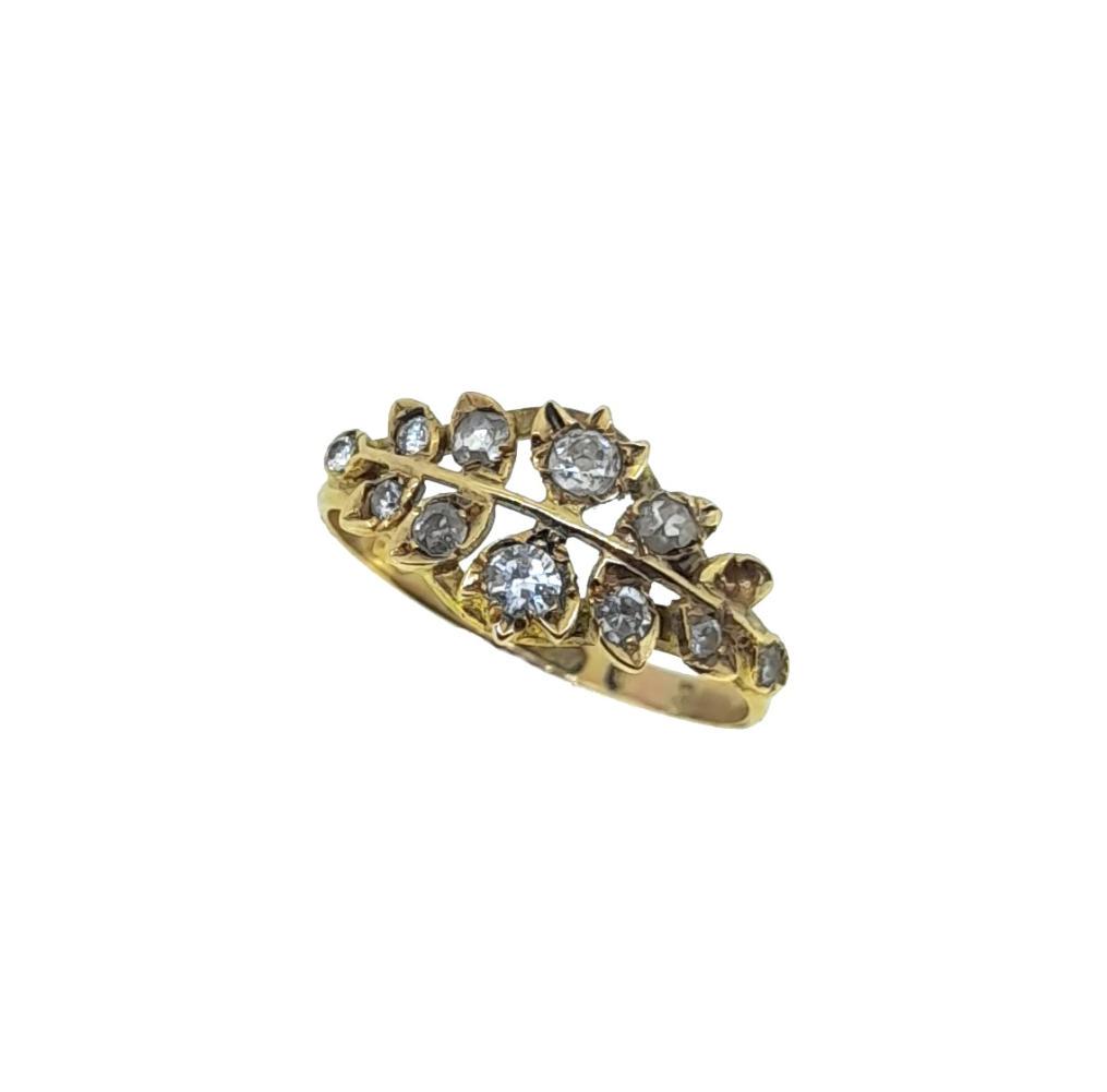 A Victorian diamond ring, pierced foliate design set with eleven rose, old brilliant and round (1 of 5)
