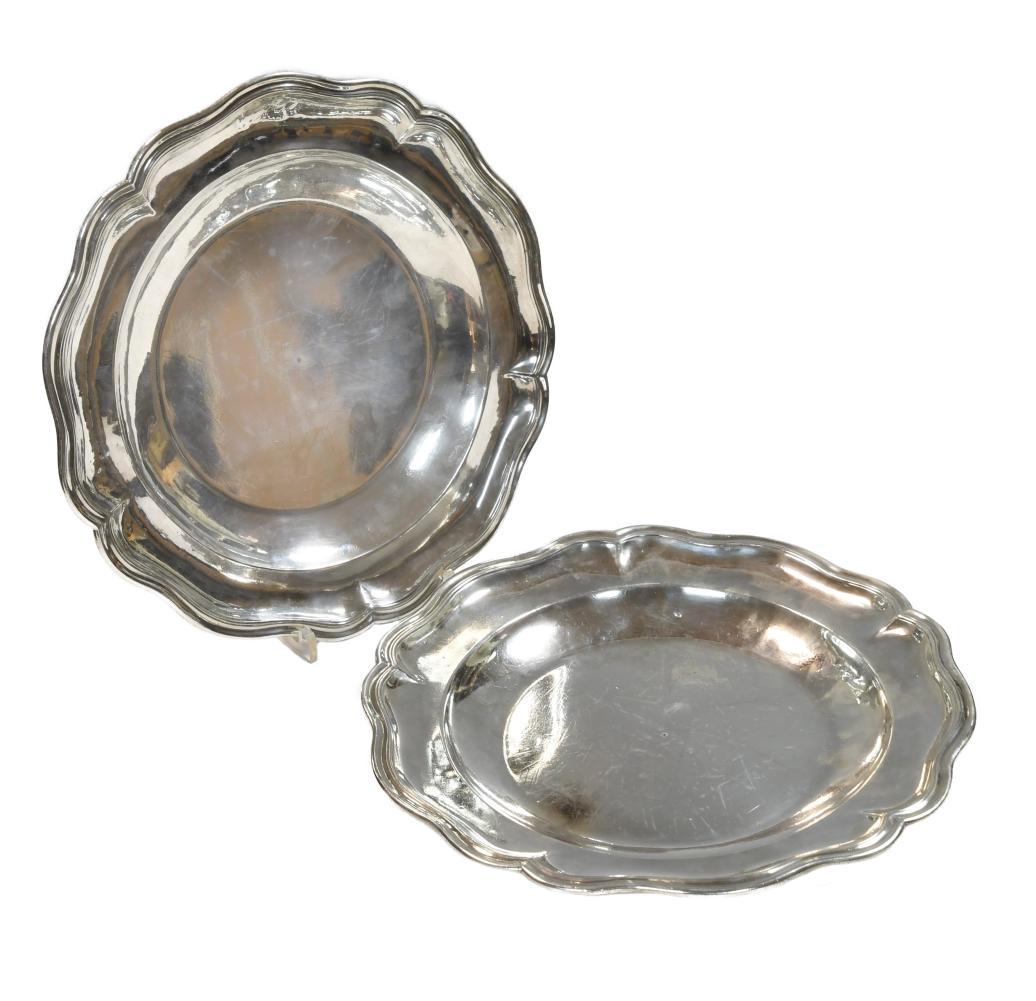 A pair of continental metalwares dinner plates, marks not identified, (crowned eagle over C.L.B over (1 of 4)