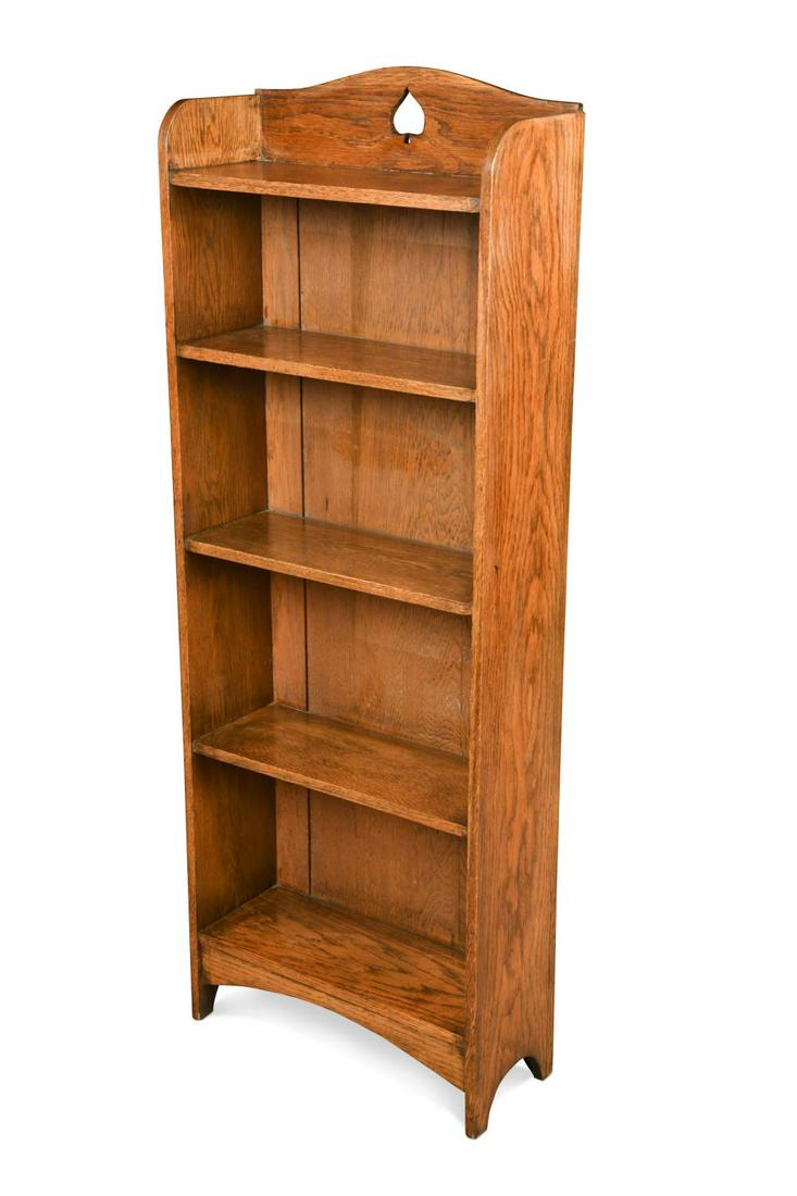 In the manner of Liberty & Co., an Arts and Crafts oak bookcase, (1 of 4)