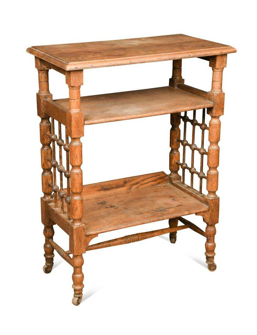 Leonard Wyburd for Liberty & Co., an oak three tier book or side table, circa 1900, (1 of 1)