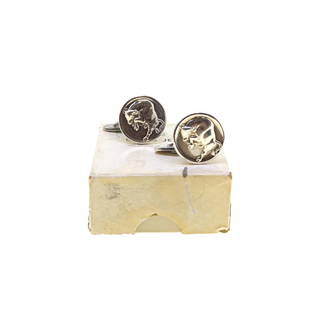 Georg Jensen - A pair of cufflinks,: Georg Jensen - A pair of cufflinks, designed by Arno Malinowski, circular panels, each with a carved charging bull, approximate diameter 11mm, oval bar terminations, unhallmarked, stamped '925S