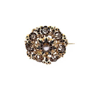 A late 19th century diamond and enamel brooch,: A late 19th century diamond and enamel brooch, openwork floral design with a central rose cut diamond, approximately 5.9 x 4.7mm, surrounded by seven flowers, each set with a central rose cut