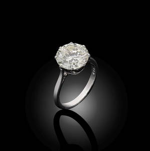 A late 20th century solitaire diamond ring,